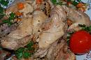 Кролик тушеный в вине с овощами